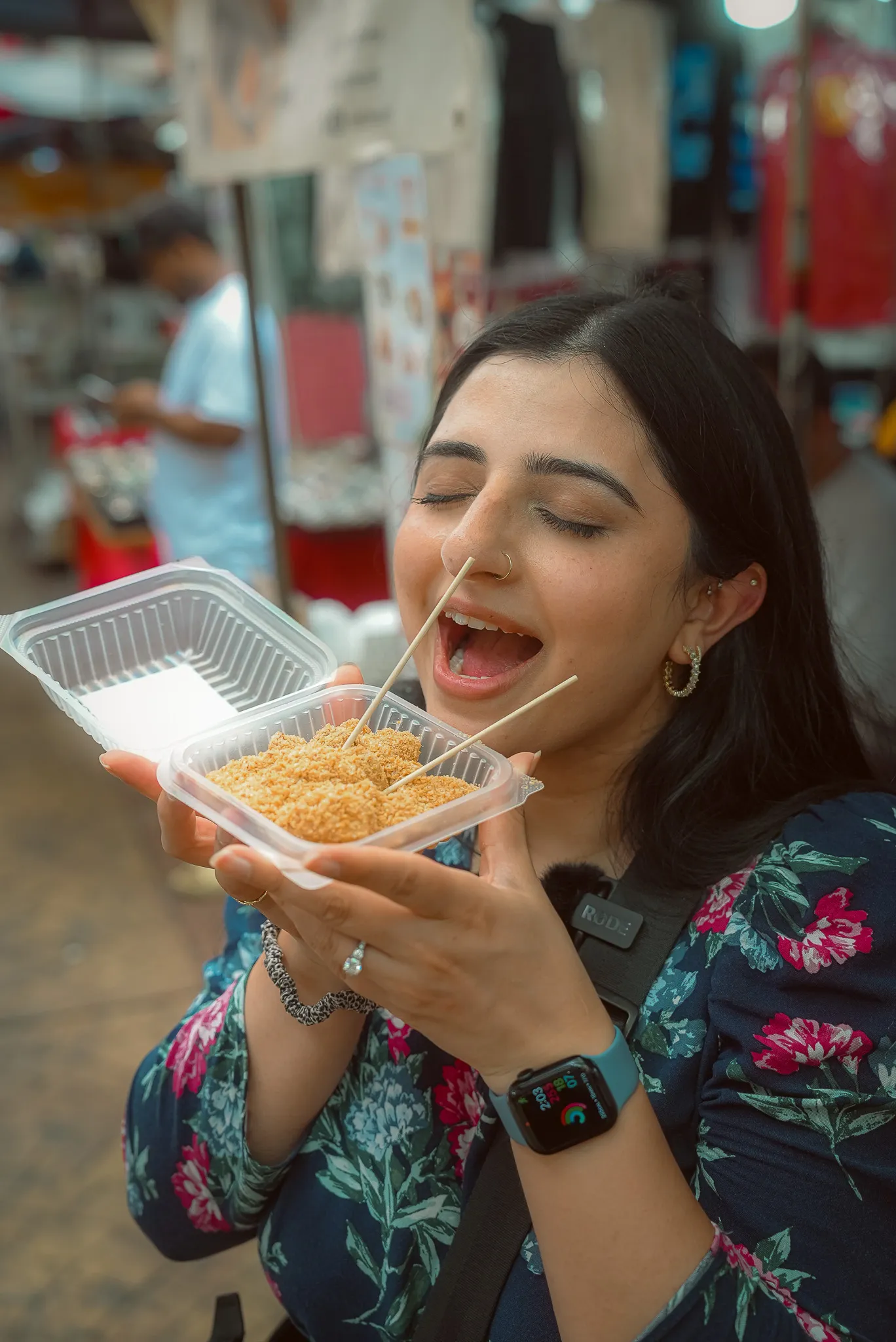 Aroob enjoying fresh mochi from No. 81 Mochi, Petaling Street, Kuala Lumpur