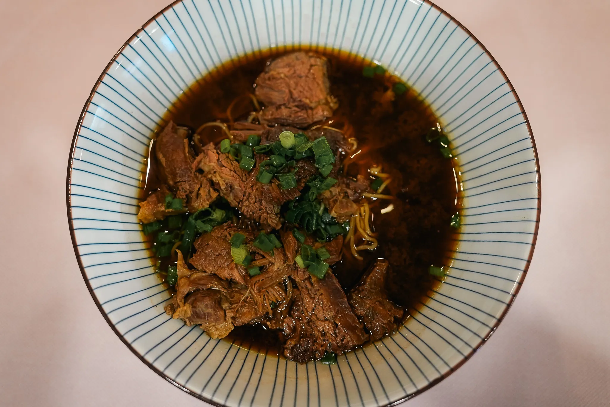 Top view of beef noodle soup at Kim Yong Gee Beef Noodle, Kuala Lumpur