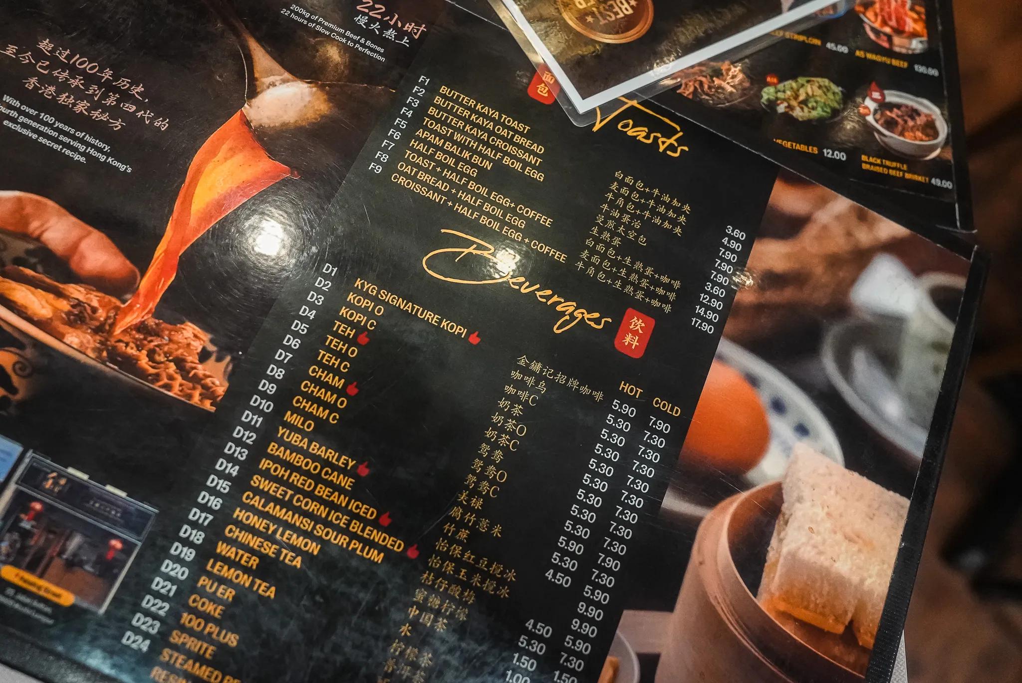Beverage menu at Kim Yong Gee (KYG) Beef Noodle, Kuala Lumpur, featuring Kopi, Teh, and traditional drinks