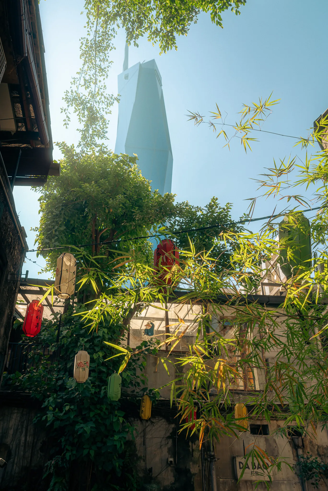 View of Merdeka 118 from Kwai Chai Hong alleyway, Kuala Lumpur, with traditional lanterns